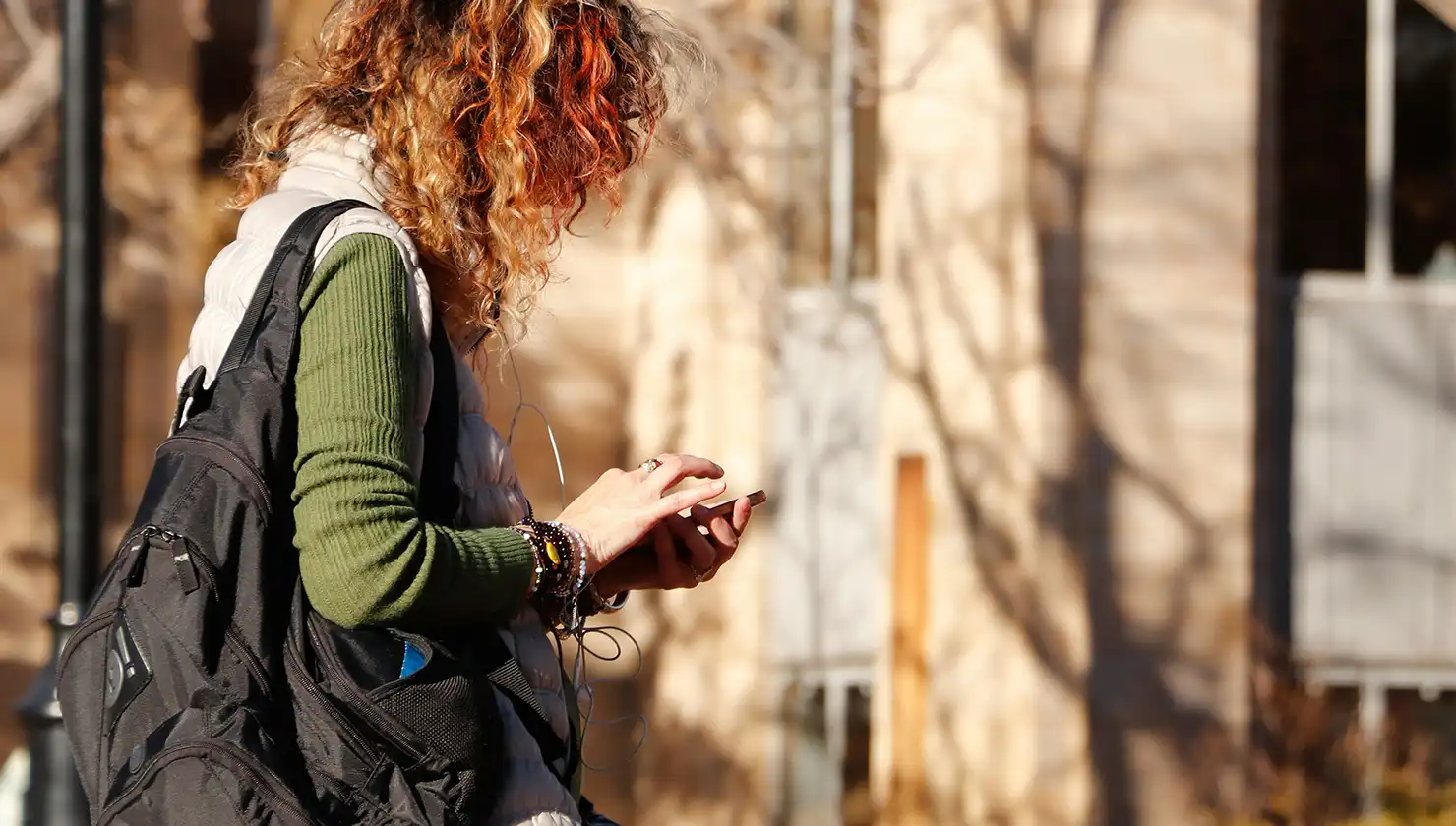 woman researching different doctors for a labiaplasty